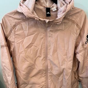 Womens Adidas blush windbreaker. Size M. Mesh lined. Hood and zipper pockets.